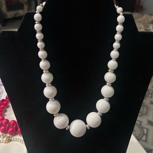 White chunky bead and silver tone necklace